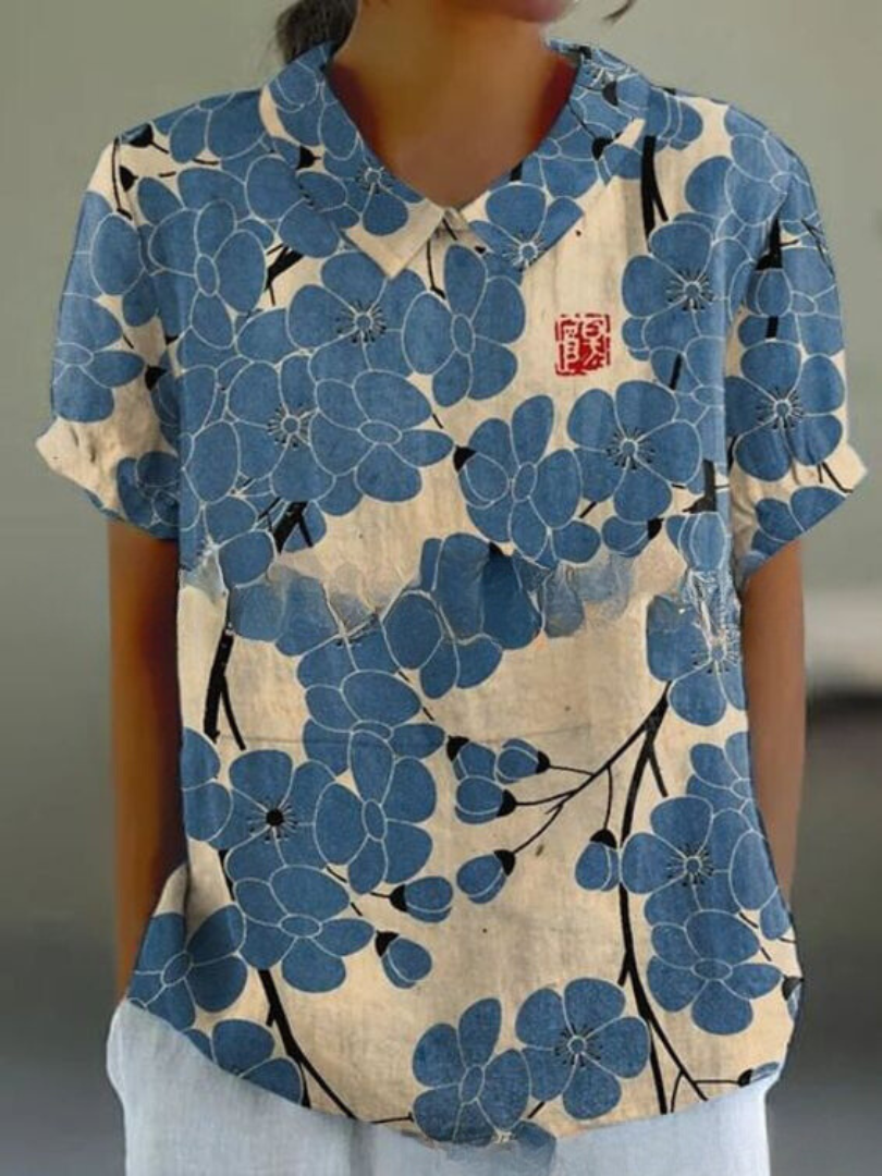 Blomstrende Bluse – Let og Luftig med Legende Blomsterprint