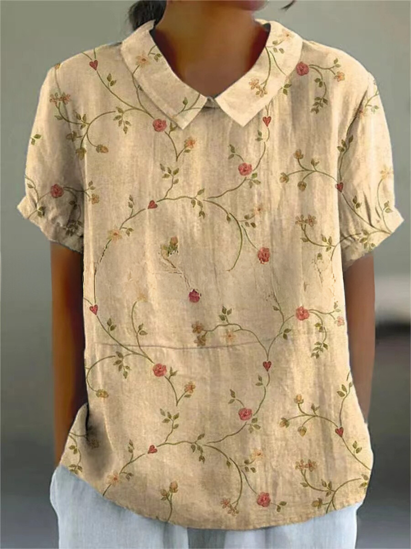 Blomstrende Bluse – Let og Luftig med Legende Blomsterprint