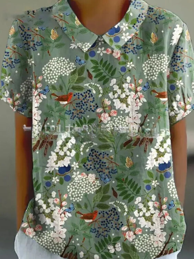 Blomstrende Bluse – Let og Luftig med Legende Blomsterprint