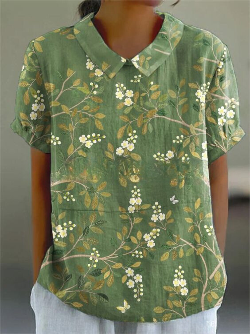 Blomstrende Bluse – Let og Luftig med Legende Blomsterprint