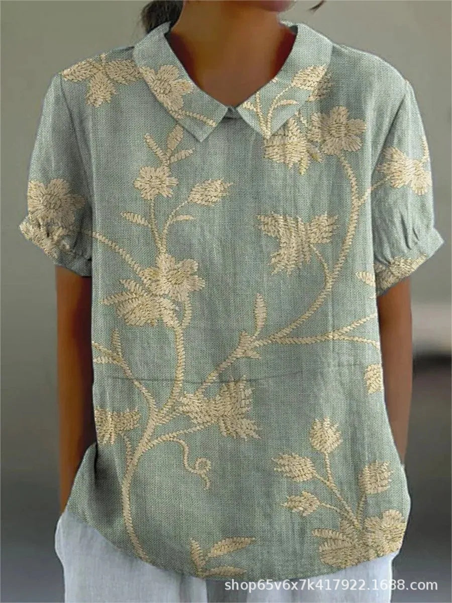Blomstrende Bluse – Let og Luftig med Legende Blomsterprint