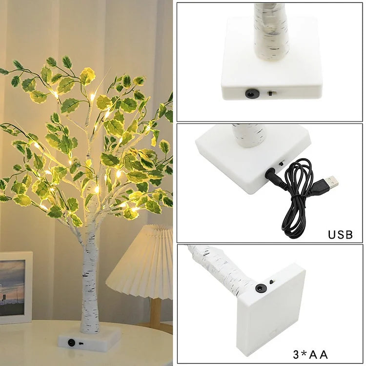 Juletræ med grønne blade og LED-lys