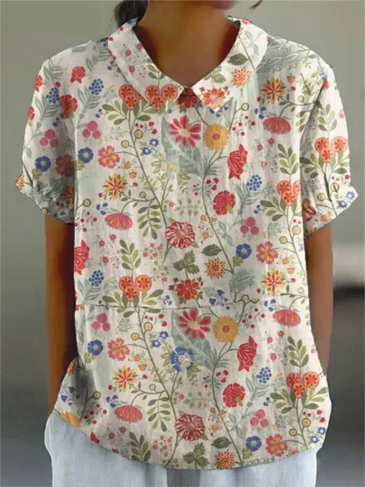 Blomstrende Bluse – Let og Luftig med Legende Blomsterprint